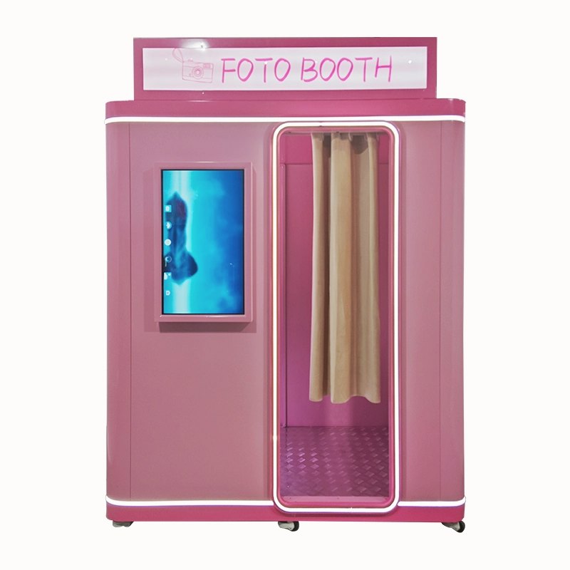 Enclosed self-service photo booth with a curtain and outside screen