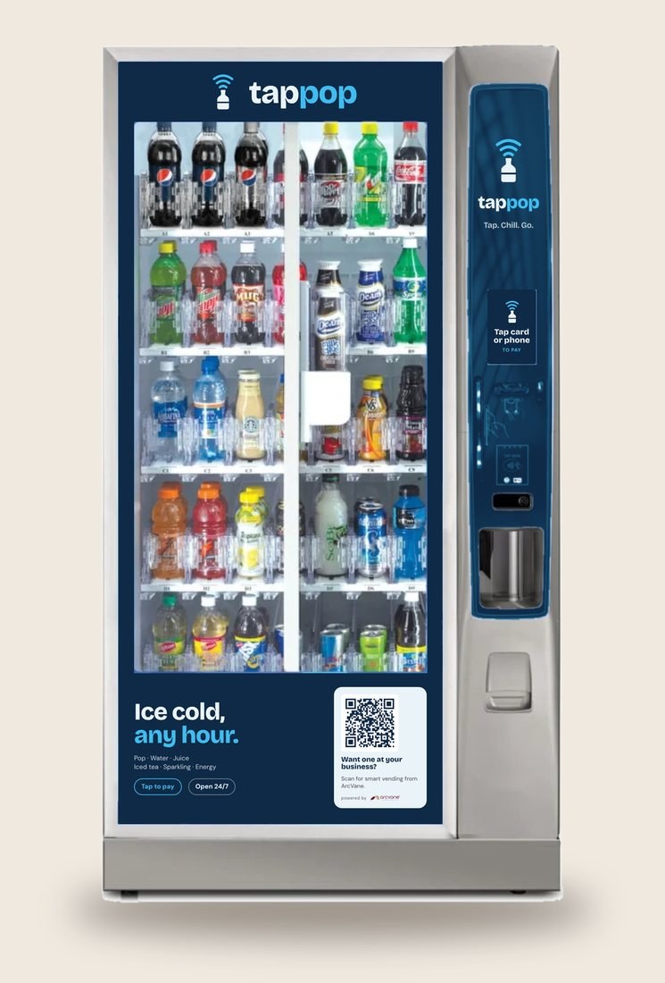 Glass-front cold drinks machine wrapped in the TapPop brand